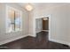 Spacious dining room with dark wood floors and chandelier at 819 S 3Rd Ave, Phoenix, AZ 85003