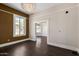 Spacious dining room with hardwood floors and views of the street at 819 S 3Rd Ave, Phoenix, AZ 85003