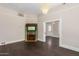 Living room featuring hardwood floors and antique fireplace at 819 S 3Rd Ave, Phoenix, AZ 85003