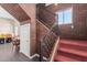 Staircase with red carpet and brick wall at 819 S 3Rd Ave, Phoenix, AZ 85003