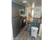 Modern kitchen with a breakfast bar and stainless steel appliances at 12123 W Bell Rd # 259, Surprise, AZ 85378