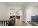 Elegant stairwell leading to the living room and upper floor at 772 N Swan Dr, Gilbert, AZ 85234