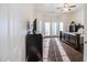Bright bedroom with large windows and carpeted floor at 772 N Swan Dr, Gilbert, AZ 85234