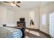 Primary bedroom with ensuite bathroom access and a large window at 772 N Swan Dr, Gilbert, AZ 85234