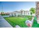 Two-story home with two car garage and landscaped yard at 772 N Swan Dr, Gilbert, AZ 85234