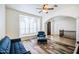 Living room features a seating area with a large window at 772 N Swan Dr, Gilbert, AZ 85234