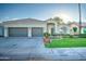 Two-story home with two car garage and landscaped yard at 772 N Swan Dr, Gilbert, AZ 85234