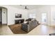 Comfortable living room with tiled floors and a view into the kitchen at 772 N Swan Dr, Gilbert, AZ 85234