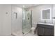 Modern bathroom with a frameless shower and updated vanity at 7413 E Taylor St, Scottsdale, AZ 85257