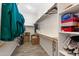 Spacious walk-in closet with shelving and hanging rods at 16205 W Berkeley Rd, Goodyear, AZ 85395