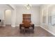 Bright dining room featuring a built-in hutch and wood table at 16205 W Berkeley Rd, Goodyear, AZ 85395