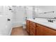 Bathroom boasts double sinks and a tiled shower/tub combo at 16205 W Berkeley Rd, Goodyear, AZ 85395