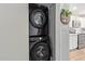Stackable Samsung washer and dryer in laundry closet at 351 E Thomas Rd # D108, Phoenix, AZ 85012