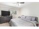 Bright bedroom with a king-size bed and dresser at 351 E Thomas Rd # D108, Phoenix, AZ 85012