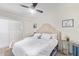 Spacious bedroom with king-size bed and neutral decor at 351 E Thomas Rd # D108, Phoenix, AZ 85012