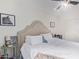 Bright bedroom with king-size bed and ceiling fan at 351 E Thomas Rd # D108, Phoenix, AZ 85012