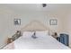 Bedroom with king-size bed, neutral decor, and nightstands at 351 E Thomas Rd # D108, Phoenix, AZ 85012