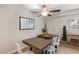 Dining room with farmhouse table and white chairs at 351 E Thomas Rd # D108, Phoenix, AZ 85012