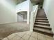 View of staircase leading to upper level at 17514 W Caribbean Ln, Surprise, AZ 85388