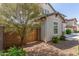 Side yard with gate and landscaping at 16245 W Culver St, Goodyear, AZ 85338