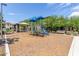 playground with play structures and wood chips at 16245 W Culver St, Goodyear, AZ 85338