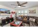 Comfortable loft with sectional sofa, large TV, and plenty of storage at 16245 W Culver St, Goodyear, AZ 85338