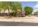 Community entrance with attractive landscaping and signage at 16245 W Culver St, Goodyear, AZ 85338