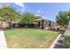 Community green space with a covered picnic area and playground at 16245 W Culver St, Goodyear, AZ 85338