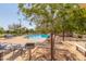 Community pool with grill and lounge chairs at 16245 W Culver St, Goodyear, AZ 85338