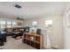Spacious loft area features a comfortable sectional sofa and plenty of natural light at 16245 W Culver St, Goodyear, AZ 85338