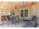 Relaxing patio area with hot tub, outdoor furniture, and string lights at 16245 W Culver St, Goodyear, AZ 85338