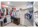 Spacious walk-in closet with ample hanging space and shelving at 16245 W Culver St, Goodyear, AZ 85338