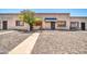 Front view of a light brown stucco duplex at 2617 W Hazelwood St, Phoenix, AZ 85017