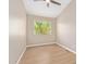 Well-lit bedroom featuring a window with blinds and ceiling fan at 9750 N Monterey Dr # 7, Fountain Hills, AZ 85268