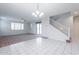 Bright dining room with tile floors and a chandelier at 26964 N 104Th Ln, Peoria, AZ 85383