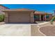 Single story home with attached garage and desert landscaping at 45737 W Ranch Rd, Maricopa, AZ 85139