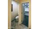 Guest bathroom with toilet and access to a walk-in closet at 45737 W Ranch Rd, Maricopa, AZ 85139
