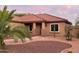 Front view of house with tile roof and desert landscaping at 45737 W Ranch Rd, Maricopa, AZ 85139