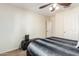 Bedroom with ceiling fan and neutral decor at 45737 W Ranch Rd, Maricopa, AZ 85139
