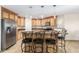 Kitchen features stainless steel appliances and granite countertops at 45737 W Ranch Rd, Maricopa, AZ 85139