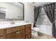 Bathroom features a vanity, toilet, and shower/tub combo at 45737 W Ranch Rd, Maricopa, AZ 85139