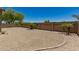 Landscaped backyard with gravel and desert plants at 45737 W Ranch Rd, Maricopa, AZ 85139