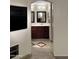 Primary bathroom with double vanity, large mirror, and tile flooring at 45737 W Ranch Rd, Maricopa, AZ 85139