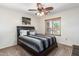 Bedroom with ceiling fan and window view at 45737 W Ranch Rd, Maricopa, AZ 85139