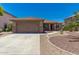 Single story home with attached garage and desert landscaping at 45737 W Ranch Rd, Maricopa, AZ 85139