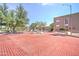 Community entrance with brick paved road at 3031 N Civic Center Plz # 219, Scottsdale, AZ 85251