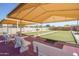 Two bocce ball courts with covered seating at 10923 W Escuda Dr, Sun City, AZ 85373