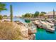 Serene lake view with a waterfall feature at 10923 W Escuda Dr, Sun City, AZ 85373