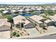 Home near a lake in a residential community at 10923 W Escuda Dr, Sun City, AZ 85373
