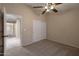 Well lit bedroom with double door closet at 10923 W Escuda Dr, Sun City, AZ 85373
